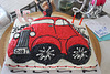 # 2  )  AH HA ..now a little red car cake...w/16 year old girl standing in the sun/moon roof :)))   GRAND DAUGHTER  !!! :))