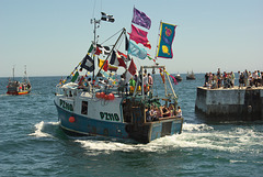 Boat race rounding Mevagissey Harbour
