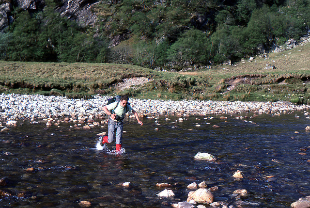 Steve crossing the Waters of Nevis after completing The Ring of Steall 11th May 1993