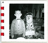 A Boy and His Fred Flintstone Punching Bag