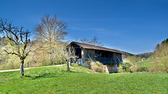 Old wooden bridge over the river Kocher