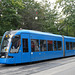 Krakow- Bombardier Tram Passing Planty Park