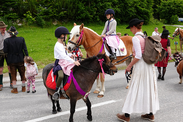 Small people and their small horses